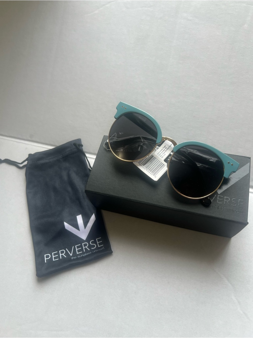 Perverse Teal Round Sunglasses with Black Lenses